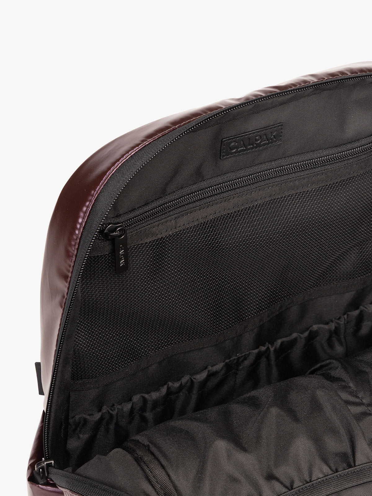 Interior of CALPAK Luka Backpack in maroon Dark Cherry ; BPL2001-GLAZED-DARK-CHERRY