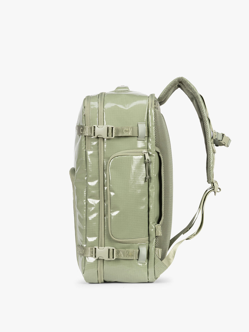 Side view of CALPAK Terra 35L Laptop Backpack Duffel in olive green Juniper on a white background
