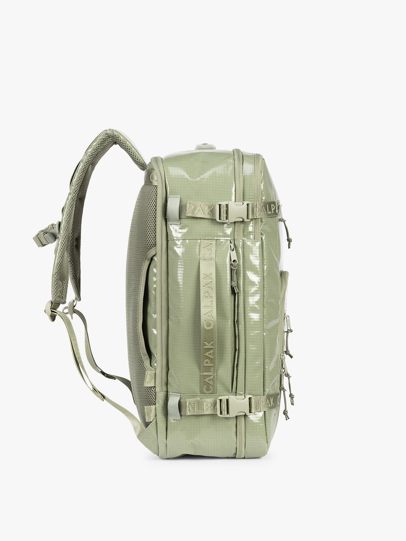 Side view of CALPAK Terra 35L Laptop Backpack Duffel in olive green Juniper on a white background
