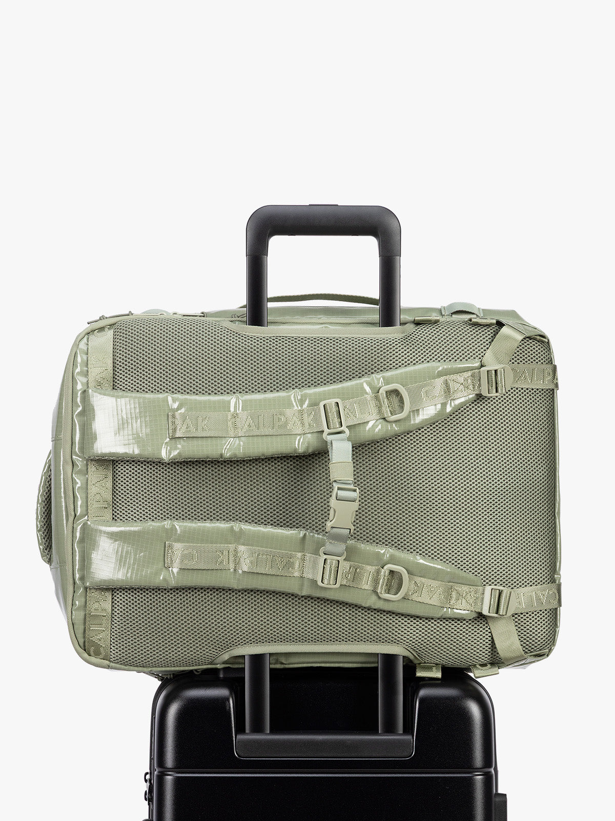 Back trolley sleeve of CALPAK Terra 35L Laptop Backpack Duffel in olive green Juniper on a white background; BPTL2601-JUNIPER