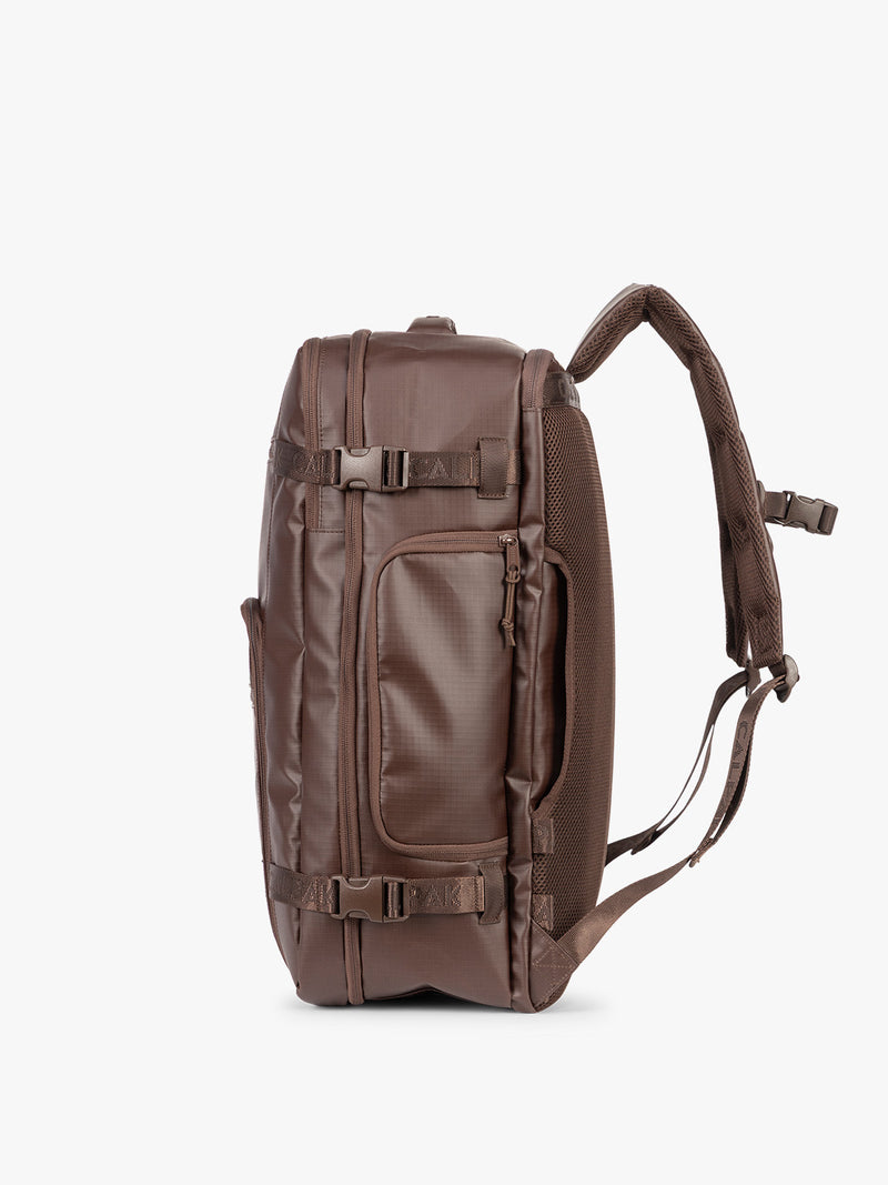 Side view of CALPAK Terra 35L Laptop Backpack Duffel in matte brown Walnut on a white background