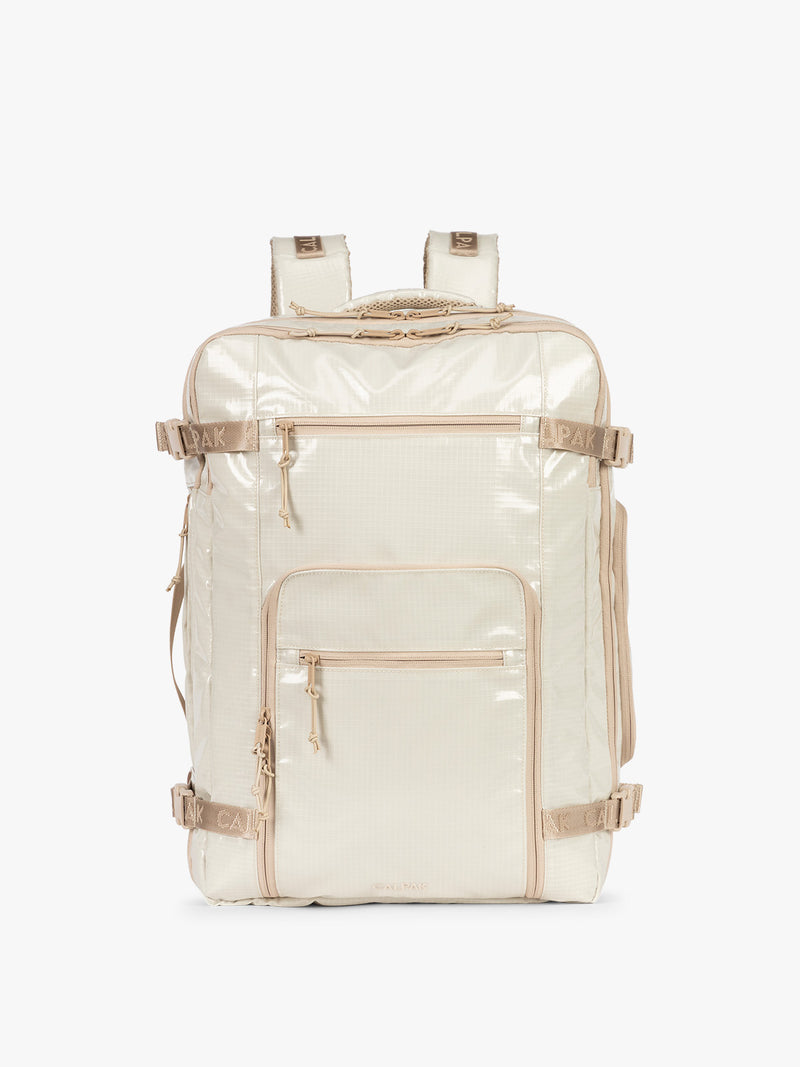 CALPAK Terra 35L Laptop Backpack Duffel in off-white White Sands with tan accents on a white background