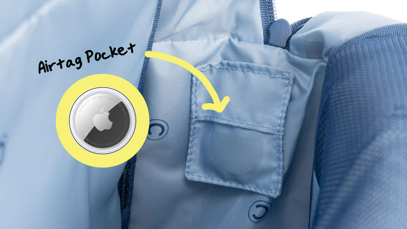 AirTag pocket in the CALPAK Kids Backpack with blue lining