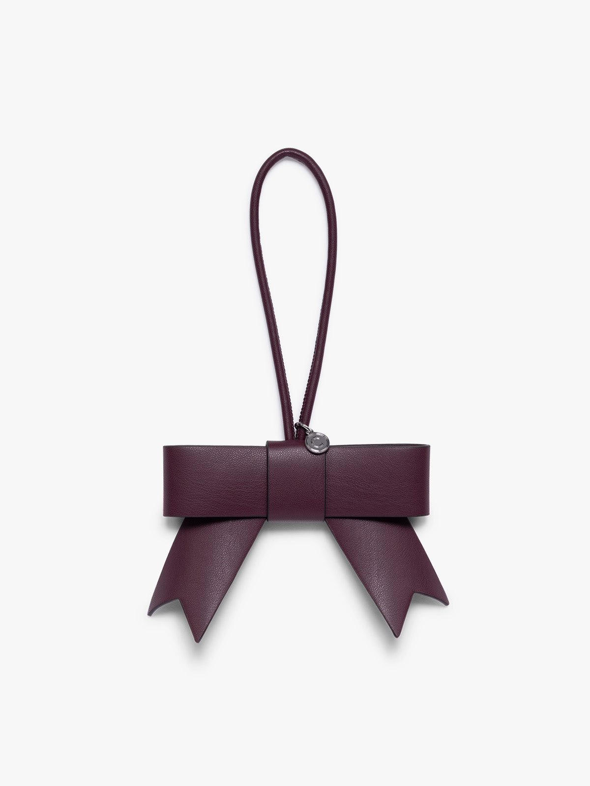 Burgundy Dark Cherry CALPAK Personalized Bow Bag Charm with a top loop, featuring a silver-tone metal ring, set against a plain light gray background ; BWBC2601-DARK-CHERRY