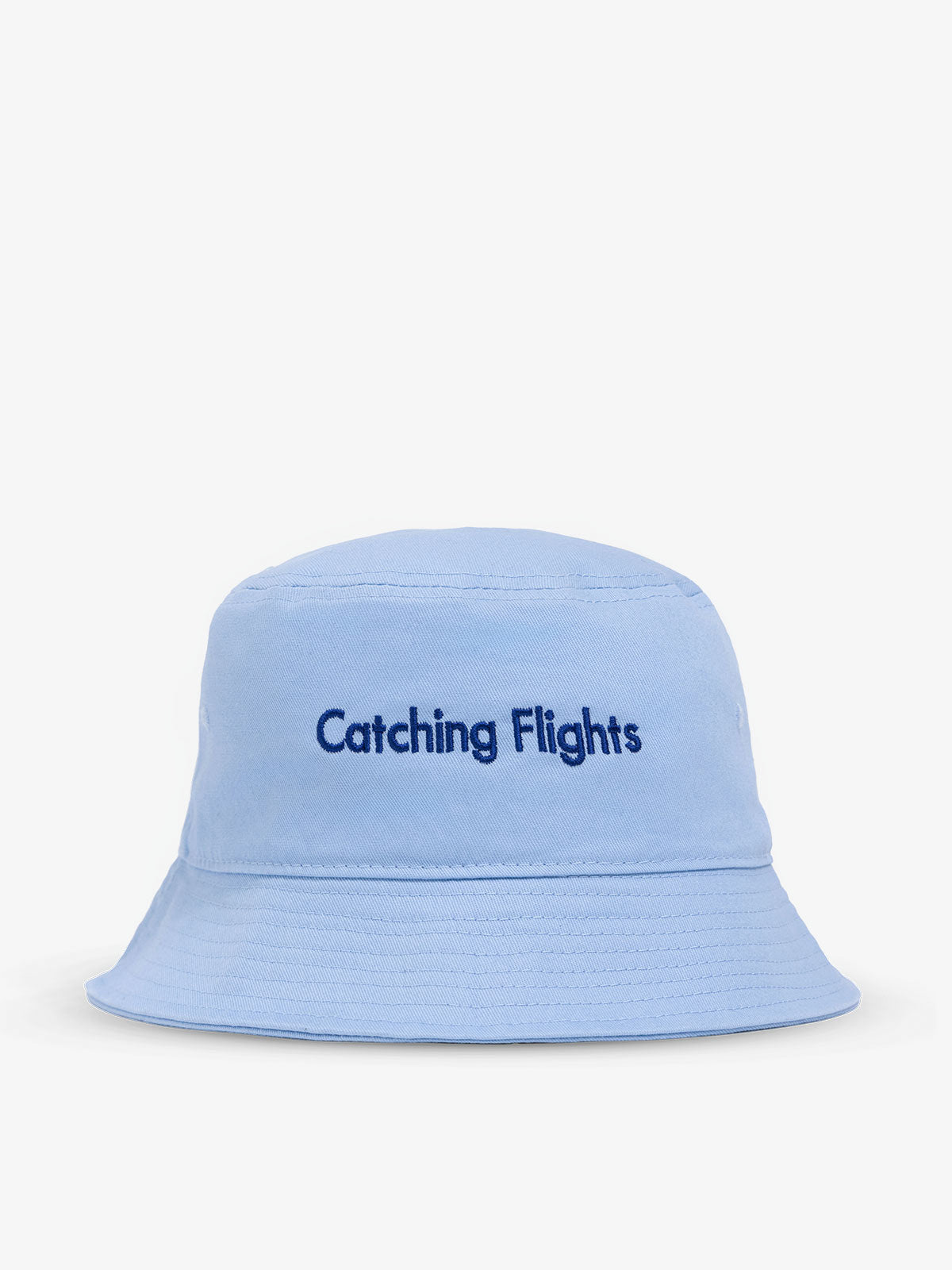 Baby blue CALPAK Bucket Hat with "Catching Flights" text on back; CPH2401-BLUE