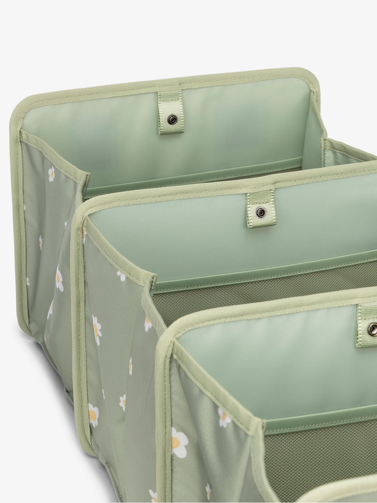 collapsible car trunk organizer featuring compartments in green daisy
