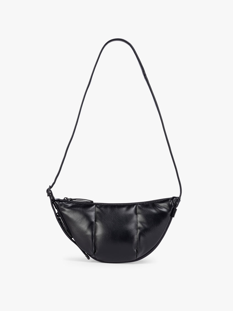 Black vegan leather Luka Crescent shoulder bag with a long thin strap, shown against a plain light gray background