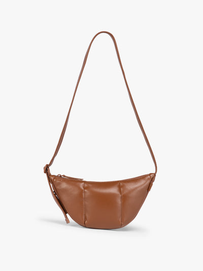 Honey Brown vegan leather Luka Crescent shoulder bag with a long thin strap, shown against a plain light gray background; CBL2601-HONEY-BROWN-PU view 1
