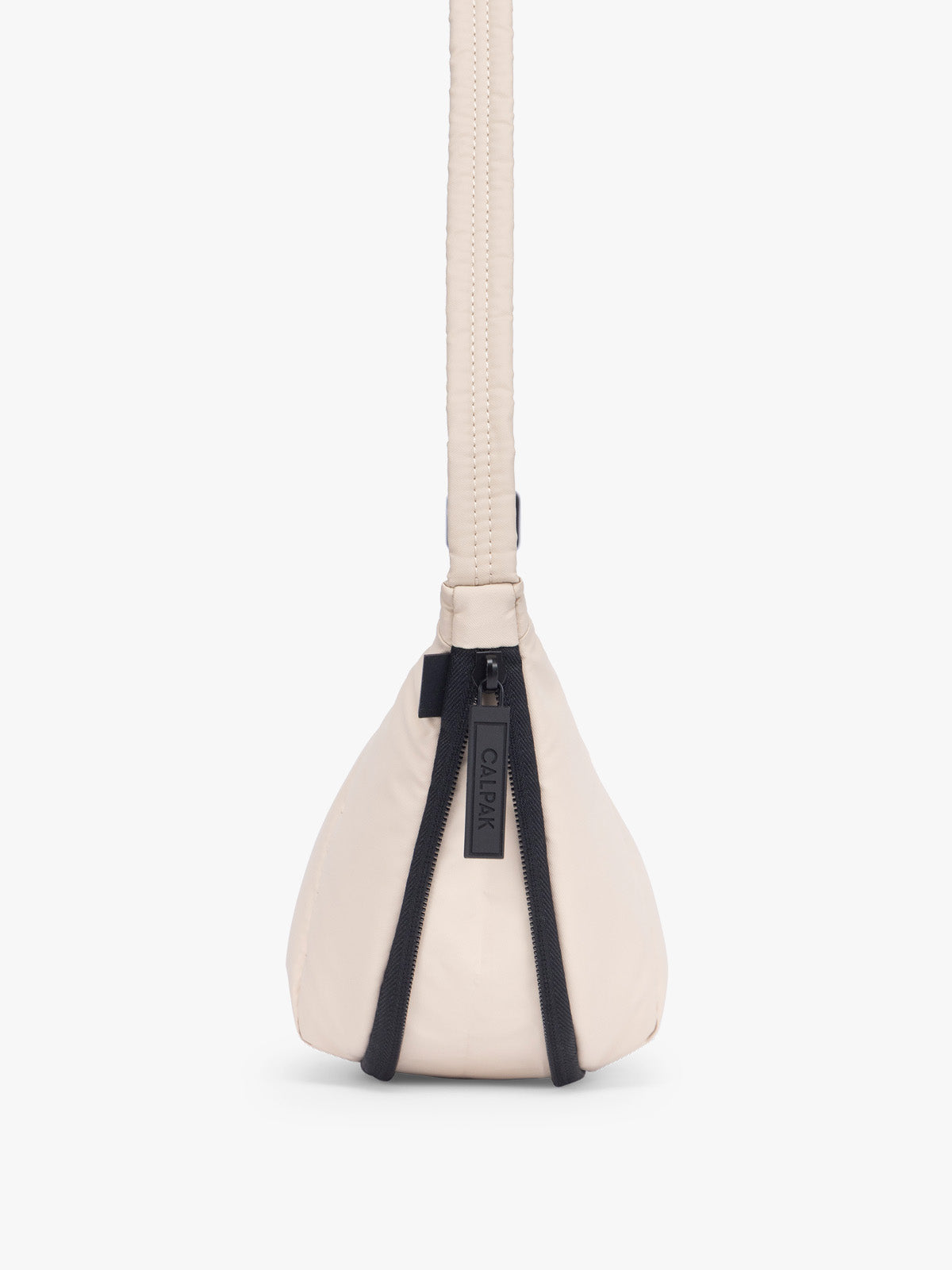 Side expandable zipper of CALPAK Luka Crescent Bag in beige off white Oatmeal; CBL2601-OATMEAL