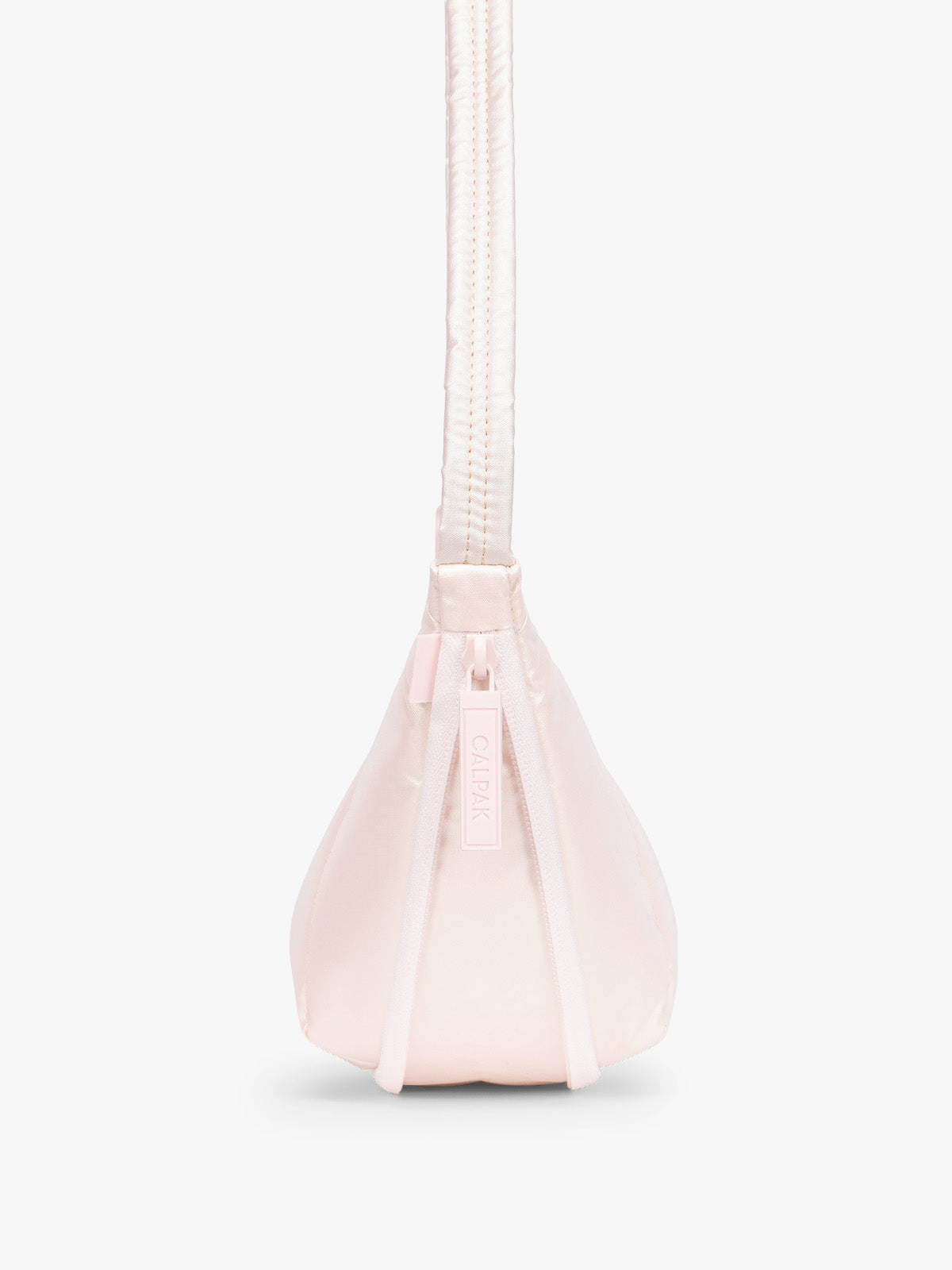 Side expandable zipper of CALPAK Luka Crescent Bag in light pink shiny Pearlescent; CBL2601-PEARLESCENT