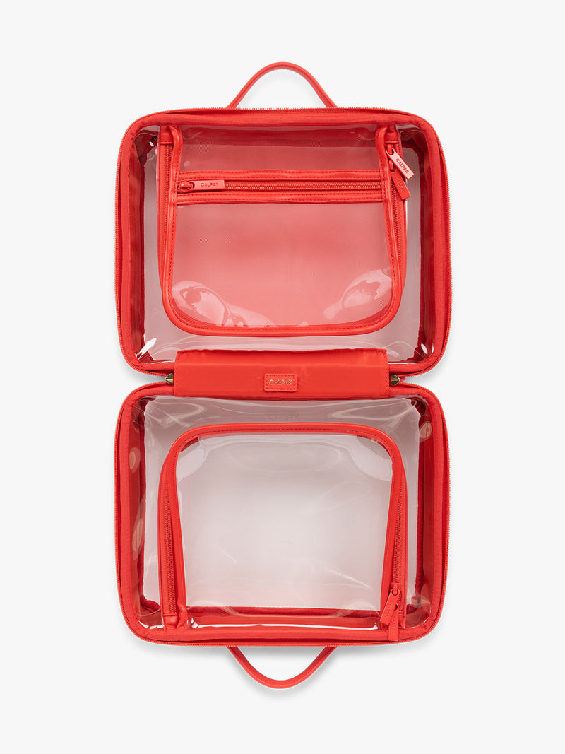 Opened view of CALPAK Large Clear Cosmetic Case in red Tomato