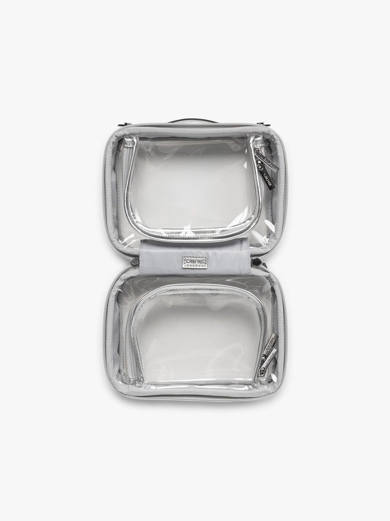 Opened view of CALPAK Small Clear Cosmetic case in Silver