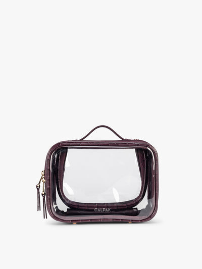 CALPAK Small Clear Cosmetics Case that is a transparent pouch with a deep red Dark Cherry in crocodile-embossed; CCM2001-DARK-CHERRY-FAUX-CROC view 1