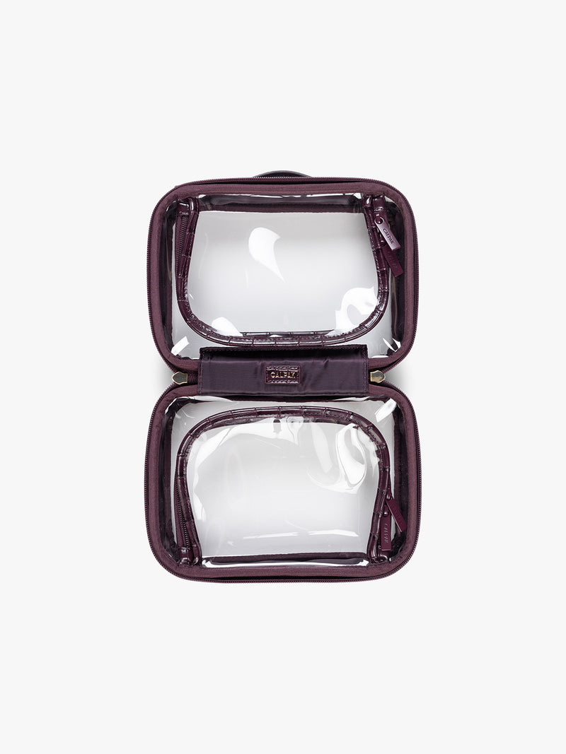 Opened view of CALPAK Small Clear Cosmetics Case that is a transparent pouch with a deep red Dark Cherry in crocodile-embossed