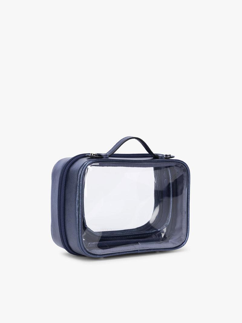 Side view of CALPAK Small Clear Cosmetic Case in dark blue Metallic Indigo with white and dark blue gingham interior