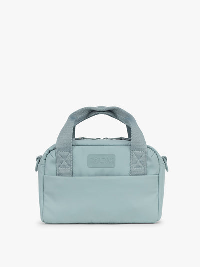 CALPAK Connect Crossbody Bag in light blue Bluebell with a visible brand logo on a white background; CCN2501-BLUEBELL view 1