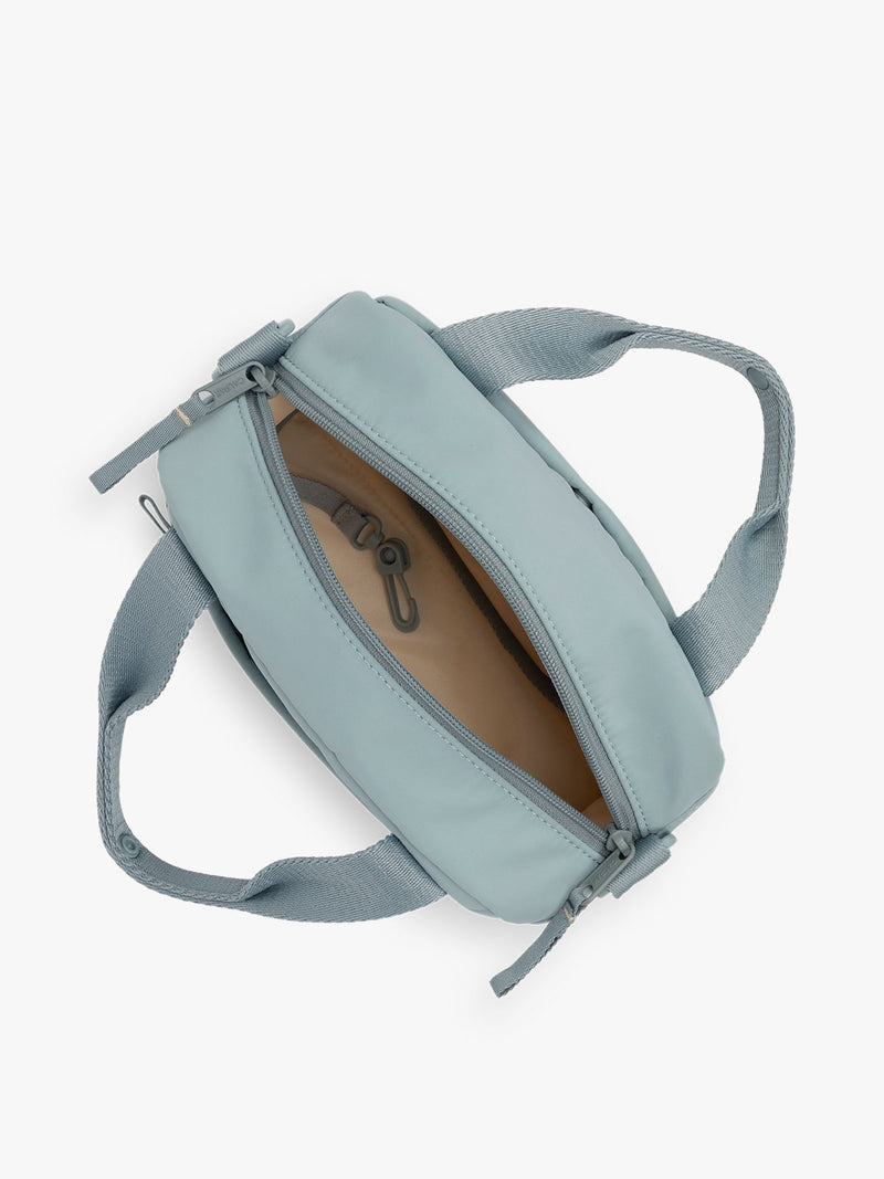 CALPAK Connect Crossbody Bag with adjustable strap in light blue color Bluebell