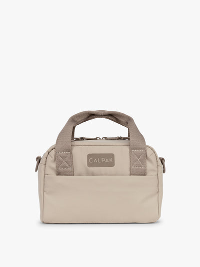 CALPAK Connect Crossbody Bag in beige Greige with a visible brand logo on a white background; CCN2501-GREIGE view 1