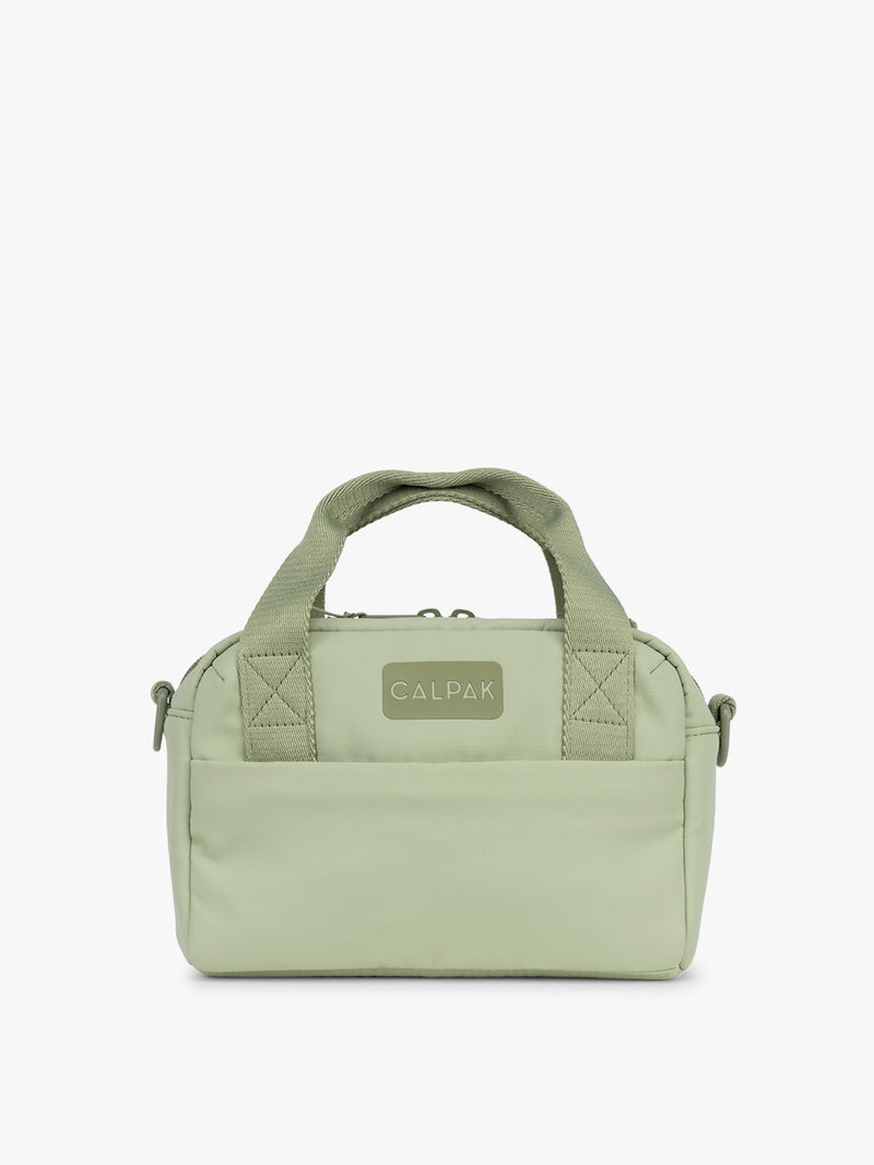 CALPAK Connect Crossbody Bag in light green Meadow with a visible brand logo on a white background