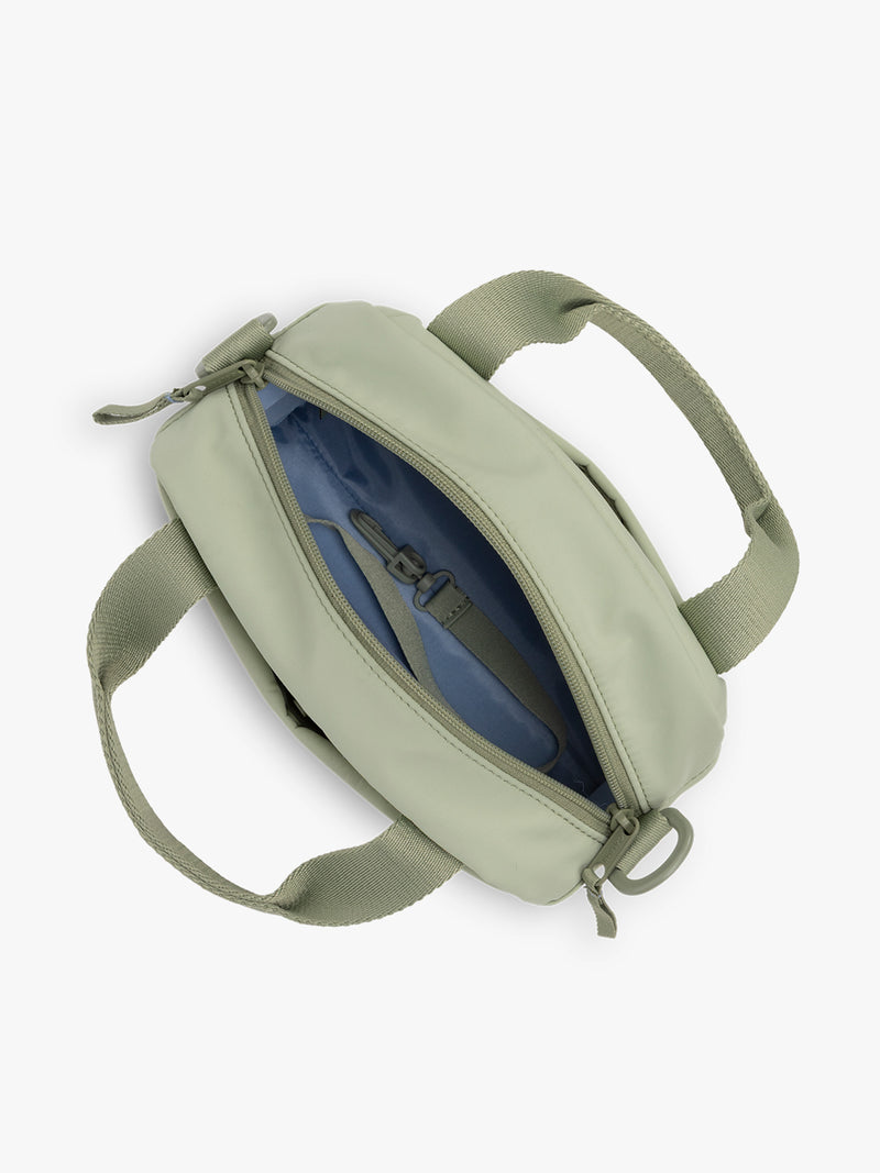 CALPAK Connect Crossbody Bag with adjustable strap in light green color Meadow