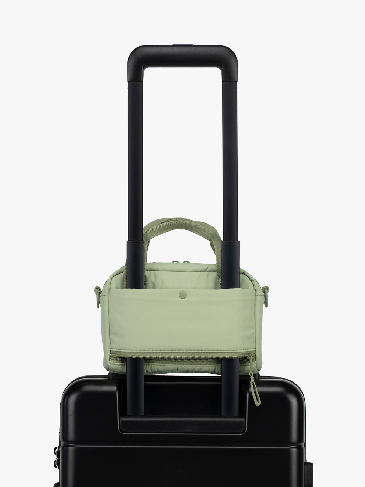 CALPAK Connect Crossbody Bag with trolley sleeve in light green Meadow; CCN2501-MEADOW