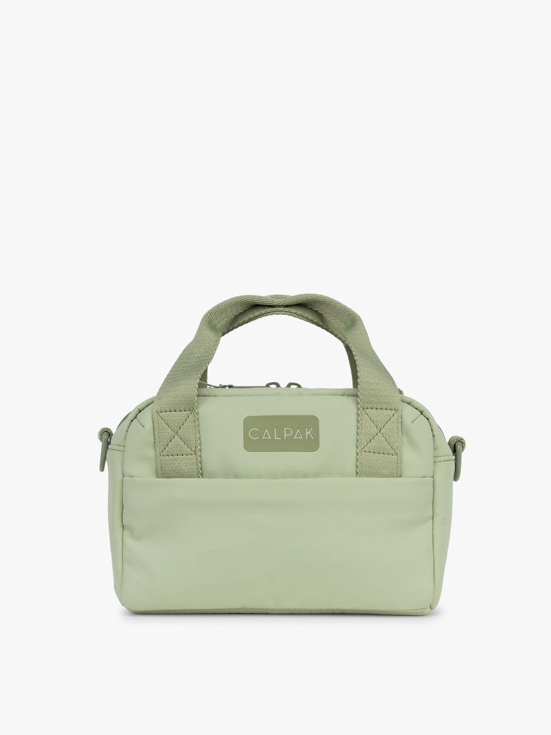 CALPAK Connect Crossbody Bag in light green Meadow with a visible brand logo on a white background