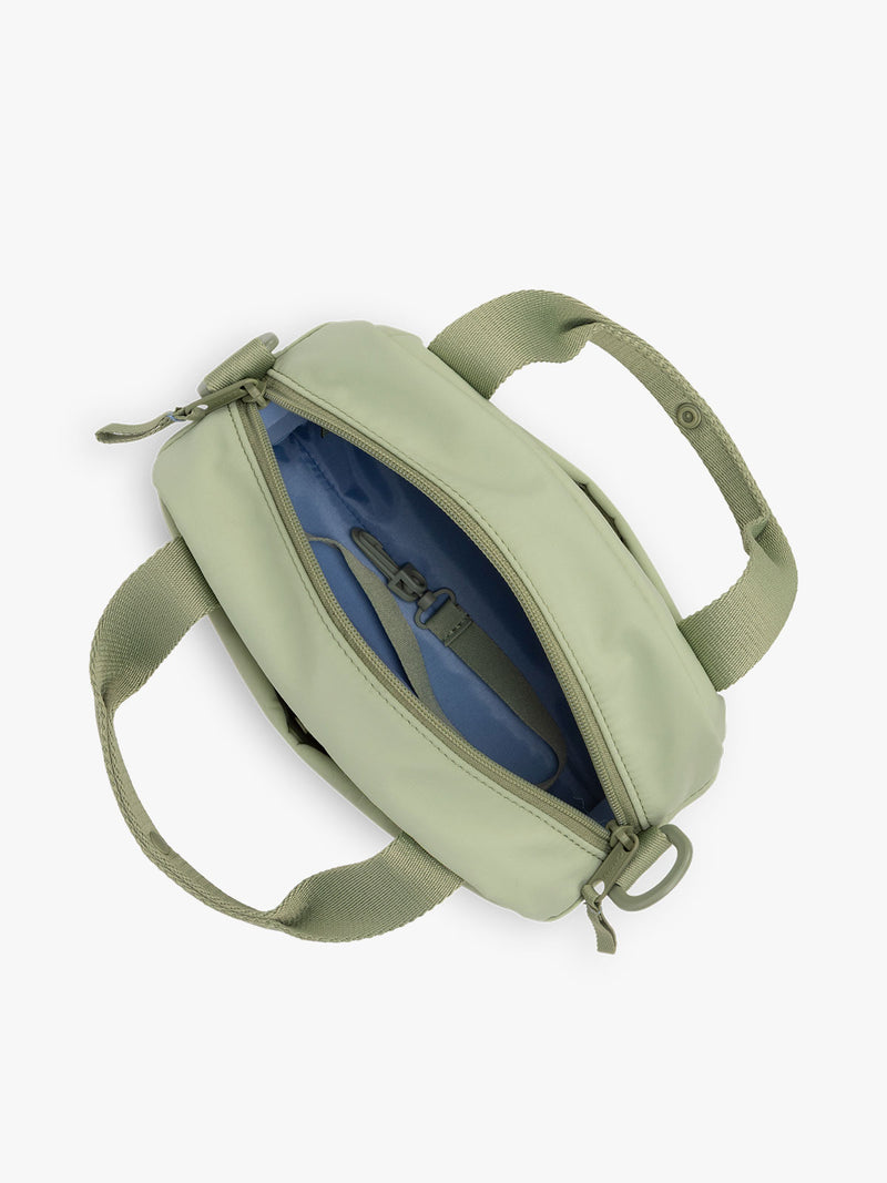 CALPAK Connect Crossbody Bag with adjustable strap in light green color Meadow