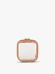 CALPAK Tiny Clear Cosmetic Case in light brown Caramel front view; CCT2501-CARAMEL