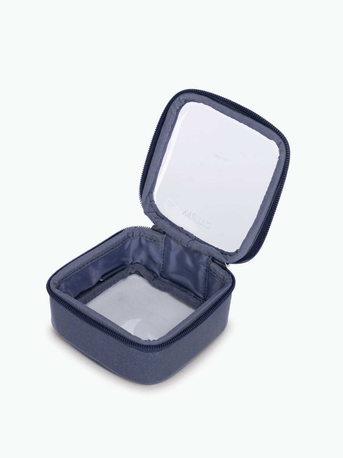 Opened view of CALPAK Clear Cosmetic Case in dark blue Metallic Indigo ; CCT2501-METALLIC-INDIGO