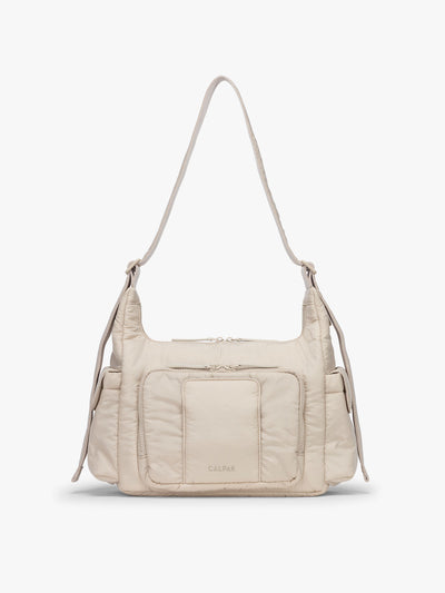 CALPAK Crossbody Diaper Bag in off-white Oatmeal; CDB2501-OATMEAL view 1