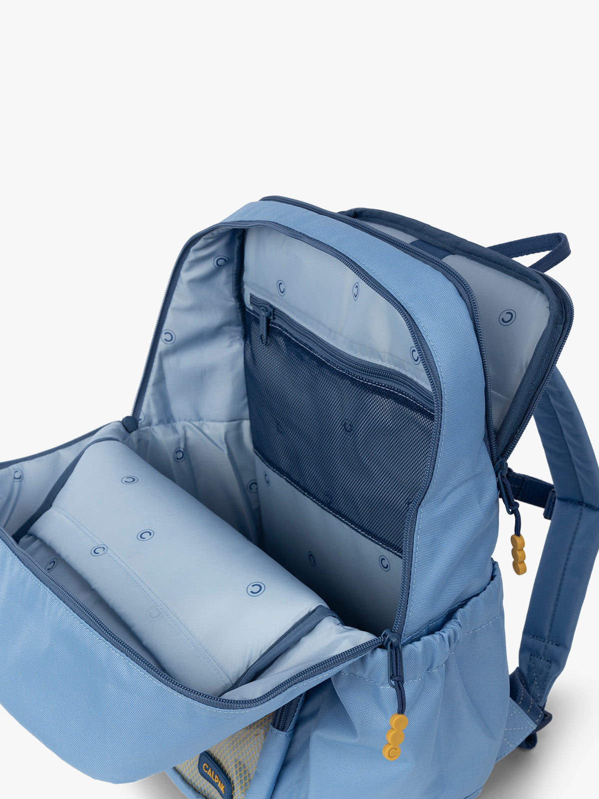 CALPAK Kids Large Backpack in Blue for ages 8-12 with back luggage trolley sleeve; CKBL2501-BLUE