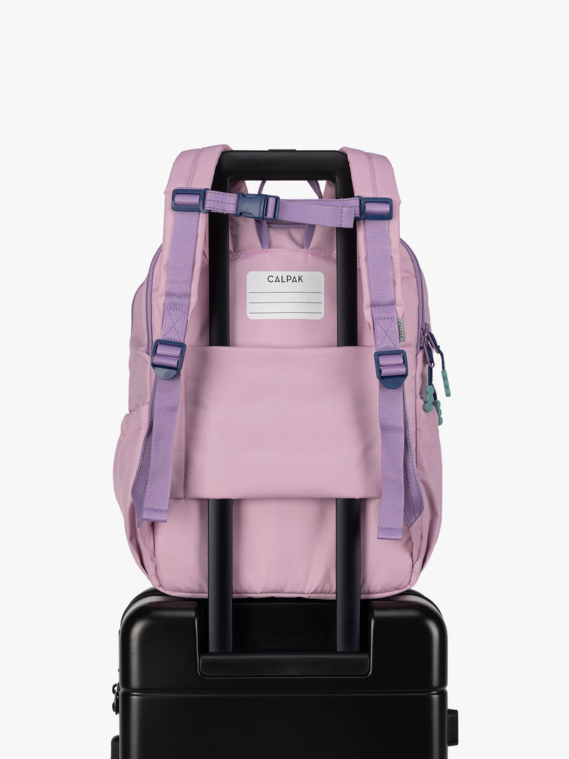 CALPAK Kids Large Backpack in pink lavender Orchid Pink for ages 8-12 with back luggage trolley sleeve