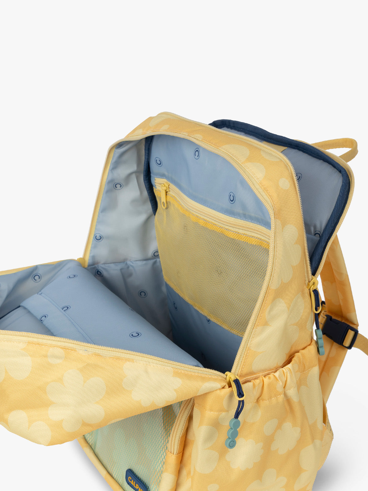 CALPAK Kids Large Backpack in yellow with tan flower print in Yellow Bloom for ages 8-12 opened view with multiple interior pockets and blue lining; CKBL2501-YELLOW-BLOOM