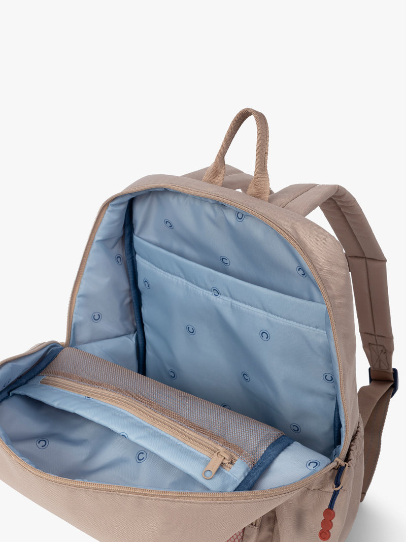CALPAK Kids Medium Backpack in brown and tan Khaki for ages 5-8 opened view with multiple interior pockets and blue lining