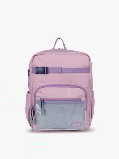 CALPAK Kids Medium Backpack in lavender pink Orchid Pink for ages 5-8 is built for your little one’s big days with lavender pink  zippers and blue mesh front pocket, multiple interior pockets, and padded comfort straps; CKBM2501-ORCHID-PINK