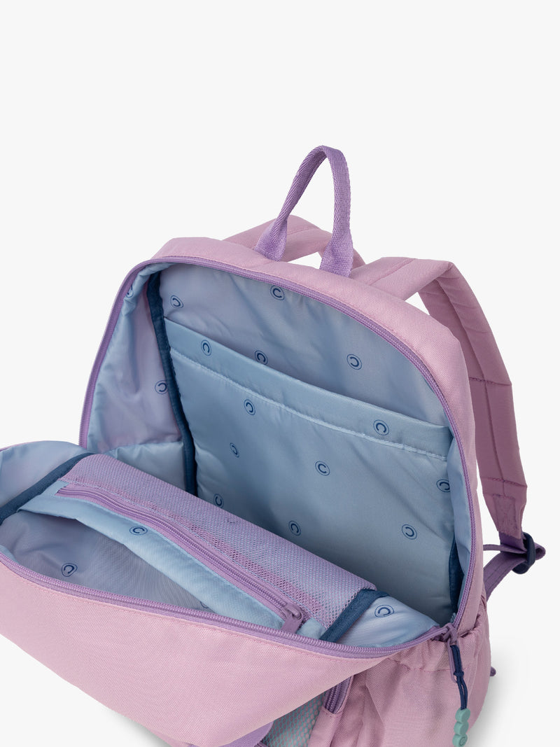 CALPAK Kids Medium Backpack in lavender pink Orchid Pink for ages 5-8 opened view with multiple interior pockets and blue lining