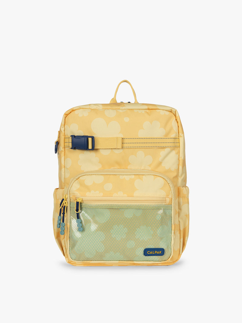 CALPAK Kids Medium Backpack in yellow with tan flower print in Yellow Bloom for ages 5-8 is built for your little one’s big days with yellow zippers and blue mesh front pocket, multiple interior pockets, and padded comfort straps