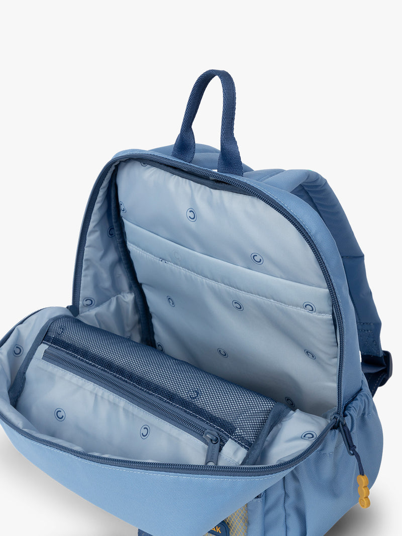 CALPAK Kids Small Backpack in Blue for ages 3-5 opened view with multiple interior pockets and blue lining