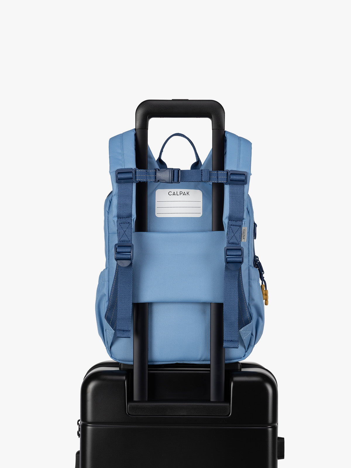 CALPAK Kids Small Backpack in Blue for ages 3-5 with back luggage trolley sleeve; CKBS2501-BLUE