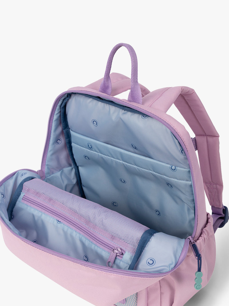 CALPAK Kids Small Backpack in lavender pink Orchid Pink for ages 3-5 opened view with multiple interior pockets and blue lining