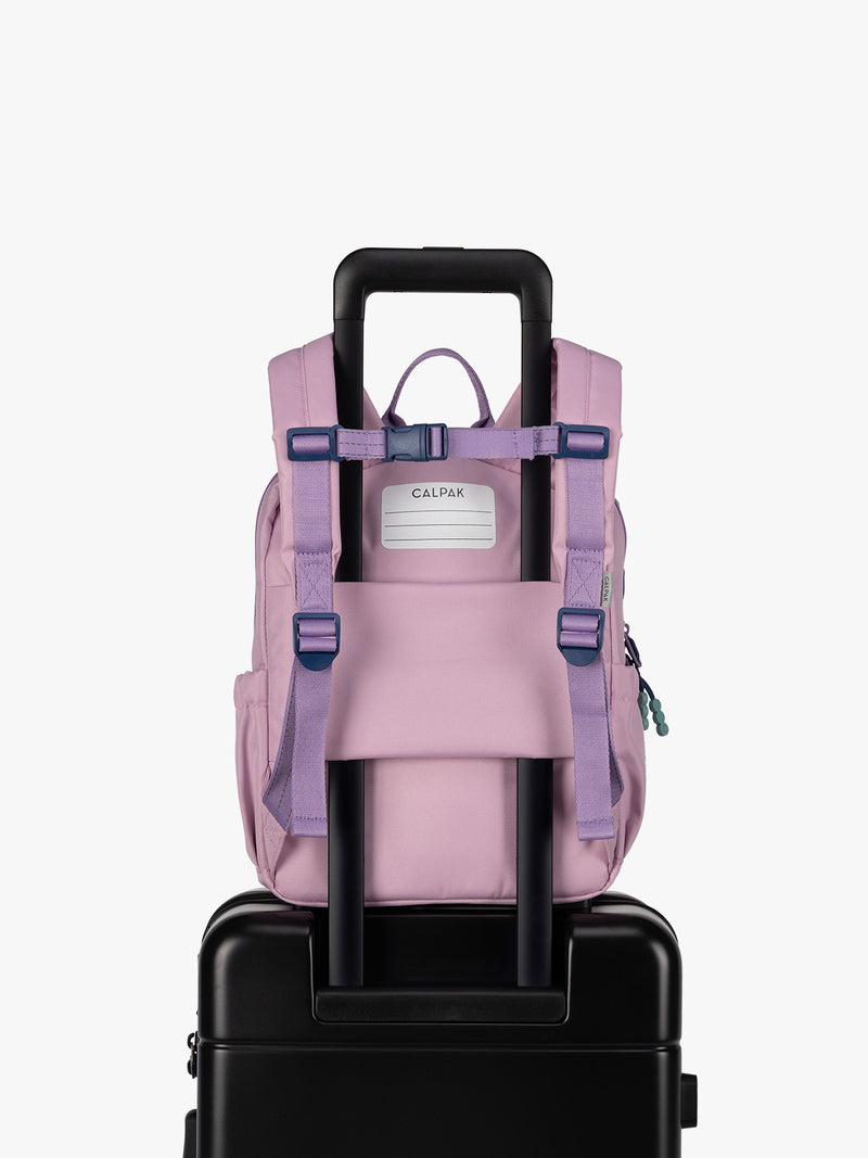 CALPAK Kids Small Backpack in lavender pink Orchid Pink with back luggage trolley sleeve