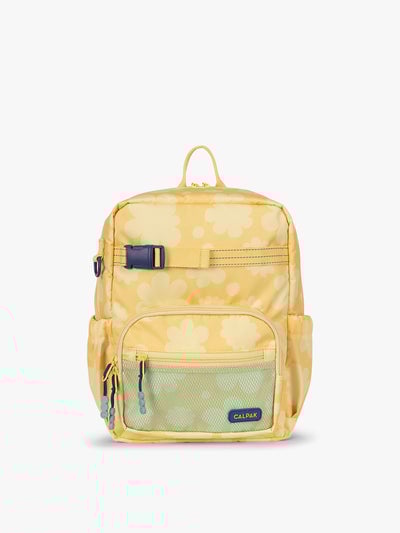 CALPAK Kids Small Backpack in yellow with tan flower print in Yellow Bloom for ages 3-5 is built for your little one’s big days with yellow zippers and blue mesh front pocket, multiple interior pockets for an 11” tablet or laptop, and padded comfort straps; CKBS2501-YELLOW-BLOOM
