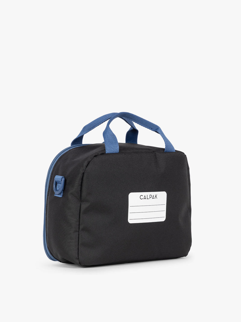 CALPAK Kids Lunch Bag in Black back view with top handle and name tag section