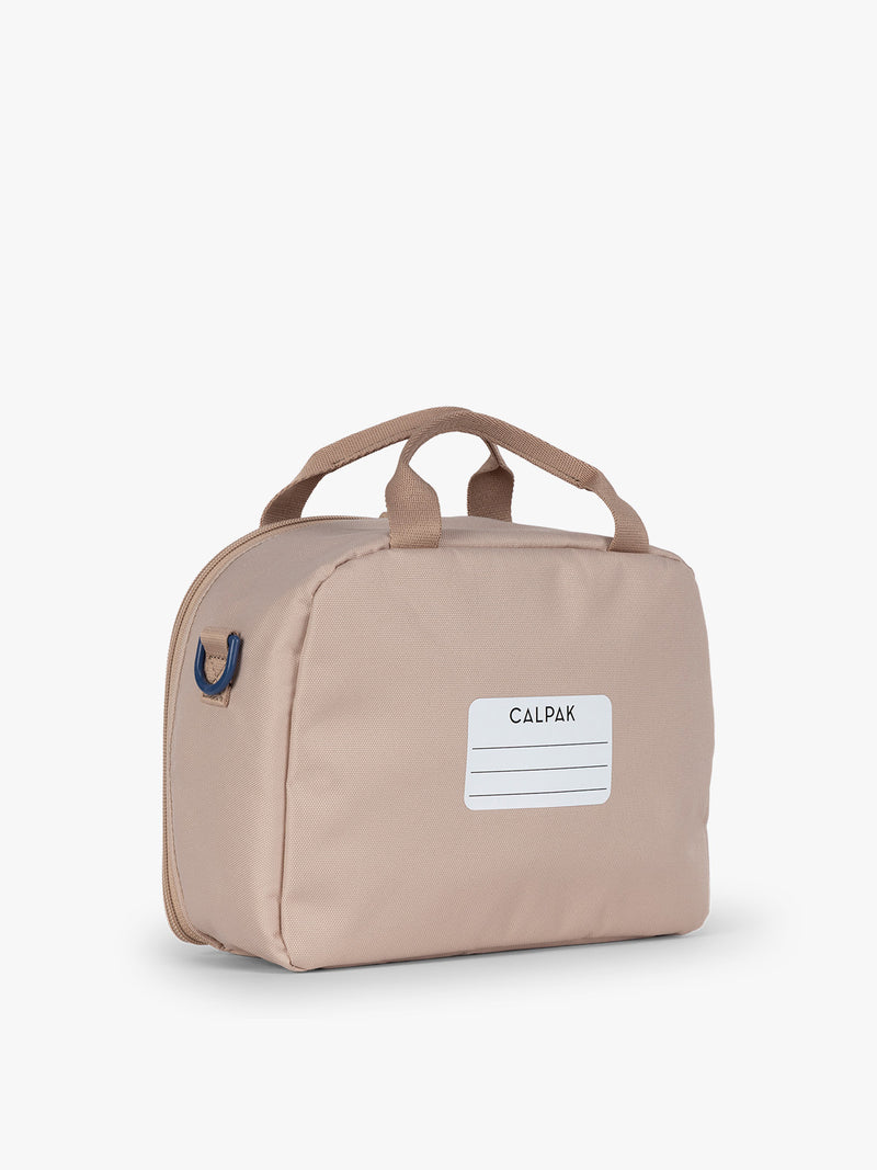 CALPAK Kids Lunch Bag in brown and tan Khaki back view with top handle and name tag section