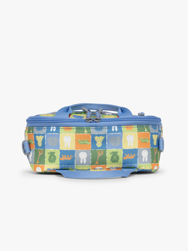 Blue CALPAK Kids Lunch Bag with Miffy and animal pattern with mesh front pocket and top handles on a white background that shows height