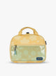 CALPAK Kids Lunch Bag in yellow with tan flower print in Yellow Bloom front view with yellow zippers and blue mesh front pocket, water-proof lining, insulated, multiple interior pockets, and back name tag; CKLB2501-YELLOW-BLOOM