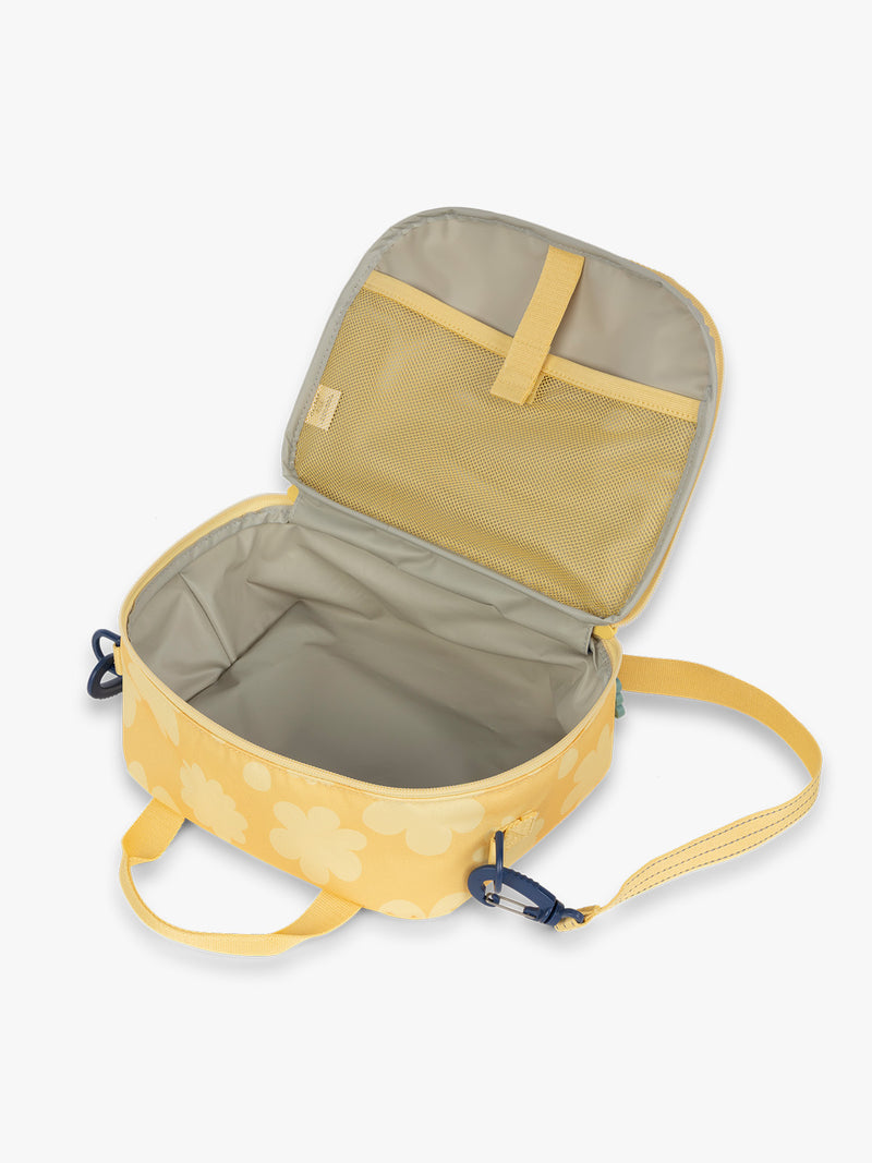 CALPAK Kids Lunch Bag in yellow with tan flower print in Yellow Bloom opened view with water-proof lining, insulated, and mesh pocket