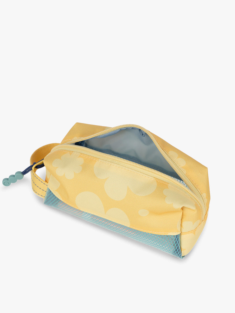 CALPAK Kids Pencil Case in yellow with tan flower print in Yellow Bloom side view with yellow zippers and blue mesh front pocket