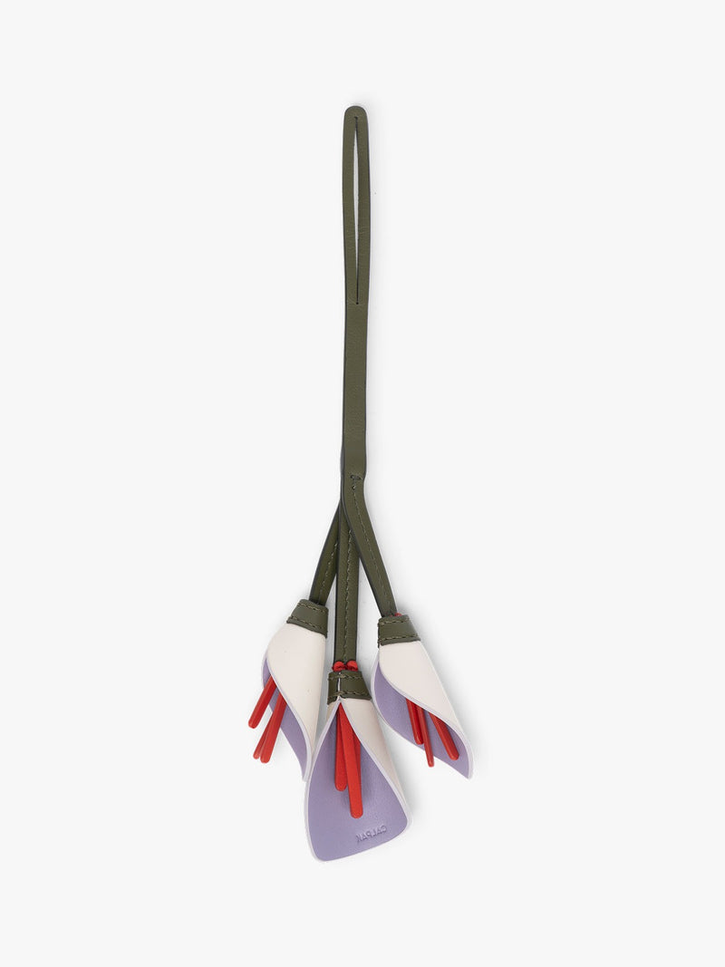 CALPAK Colette Calla Lilly Bag Charm with dark green strap and Red tomato flower stem with white and purple petals