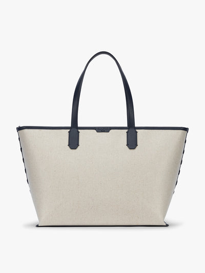 CALPAK Colette 15 Canvas Laptop Tote in beige canvas material  with blue finishing in Natural Navy; CLCT2601-NATURAL-NAVY view 1